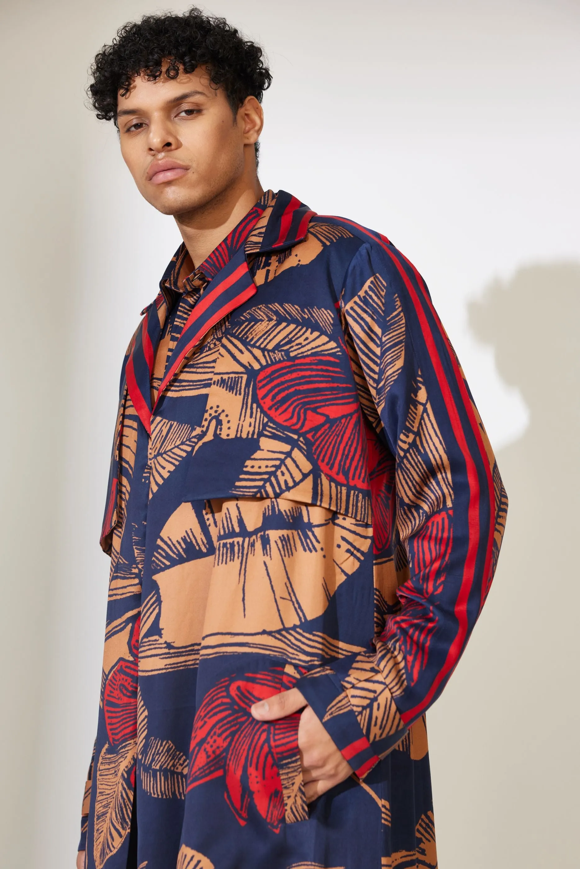 BLUE, RUST AND RED FLORAL TRENCH CAPE